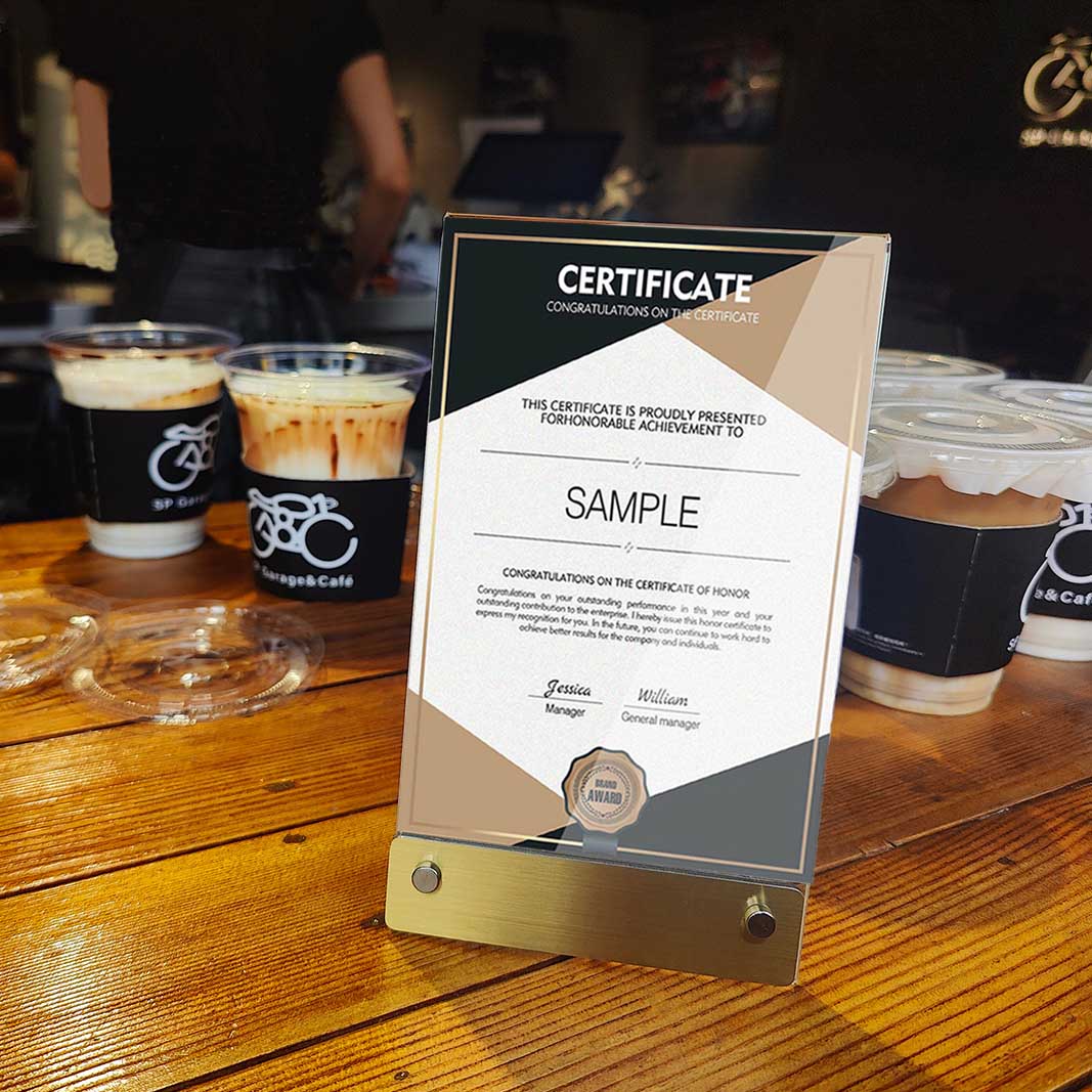 The deep sign holder blends in with the coffee and wooden table