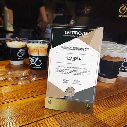 The deep sign holder blends in with the coffee and wooden table